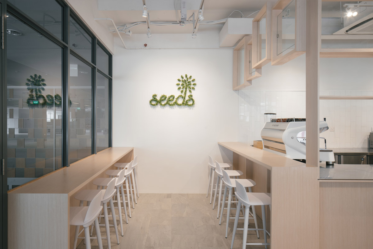 Designed by award-winning interior design firm, LAANK, Seeds Cafe is an urban sanctuary housed within the Rainbow Centre. 