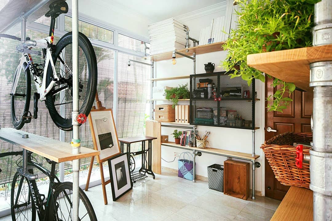 squarerooms-peng-handcrafted-wooden-furniture-workshop-bicycle-creative-shelves-pipes