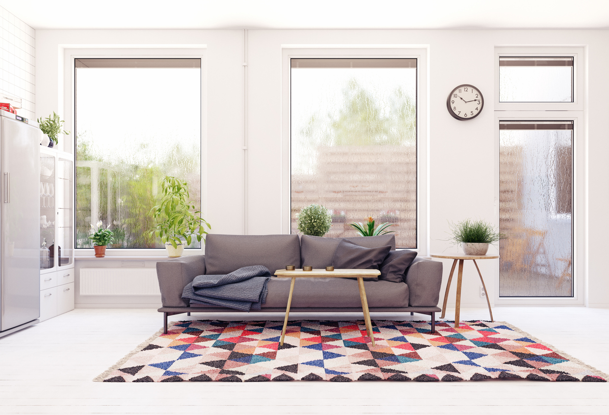 squarerooms-living-room-couch-window-bright-grey-carpet