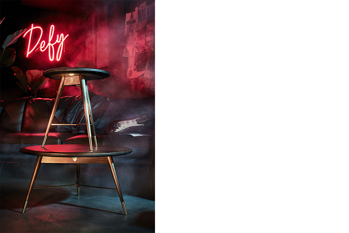 squarerooms-volta-commune-wooden-leather-coffee-table-product-shot-edgy-pink-neon-smoke-lights