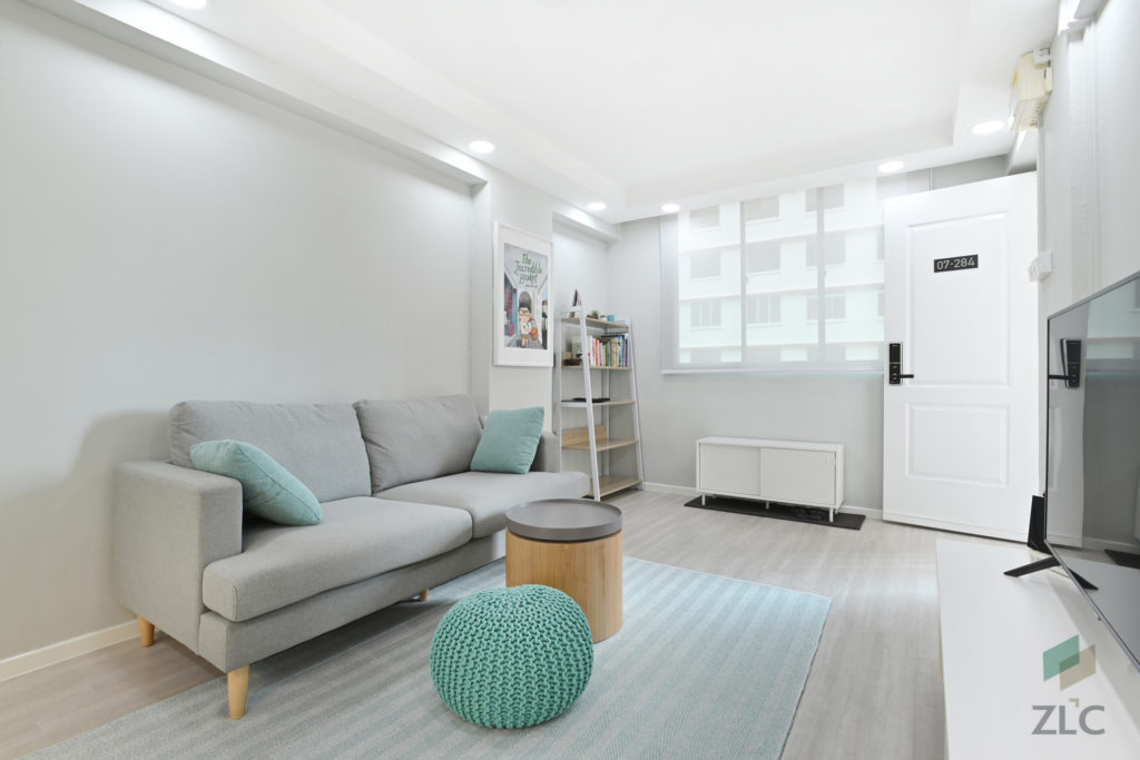 squarerooms-zlc-construction-living-room-grey-couch-pastel-blue-turquoise-cosy-simple-singapore
