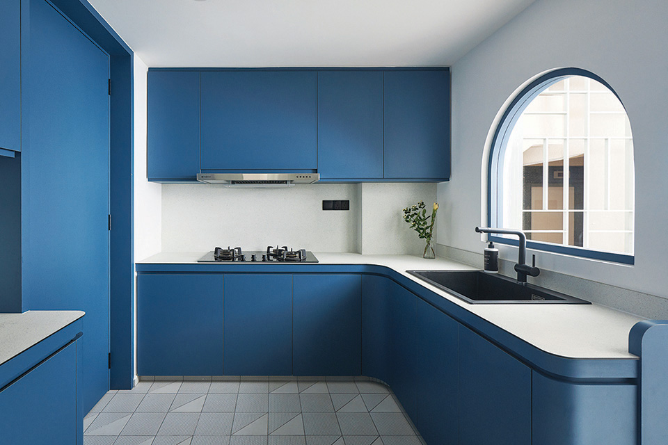 squarerooms studio fortyfour blue curved design condo kitchen