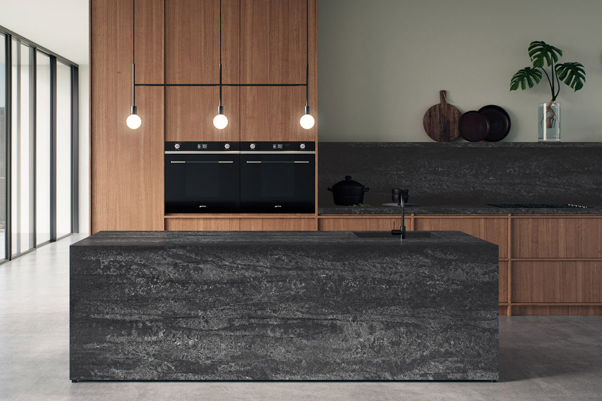 squarerooms caesarstone kitchen dark collection engineered quartz counter surface black red cabinets warm wood