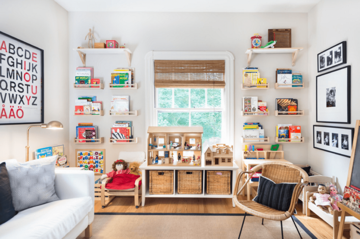 room showing a window with shelves filled with kids toys
