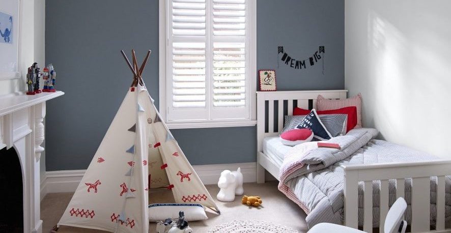 kids bedroom with grey and white walls