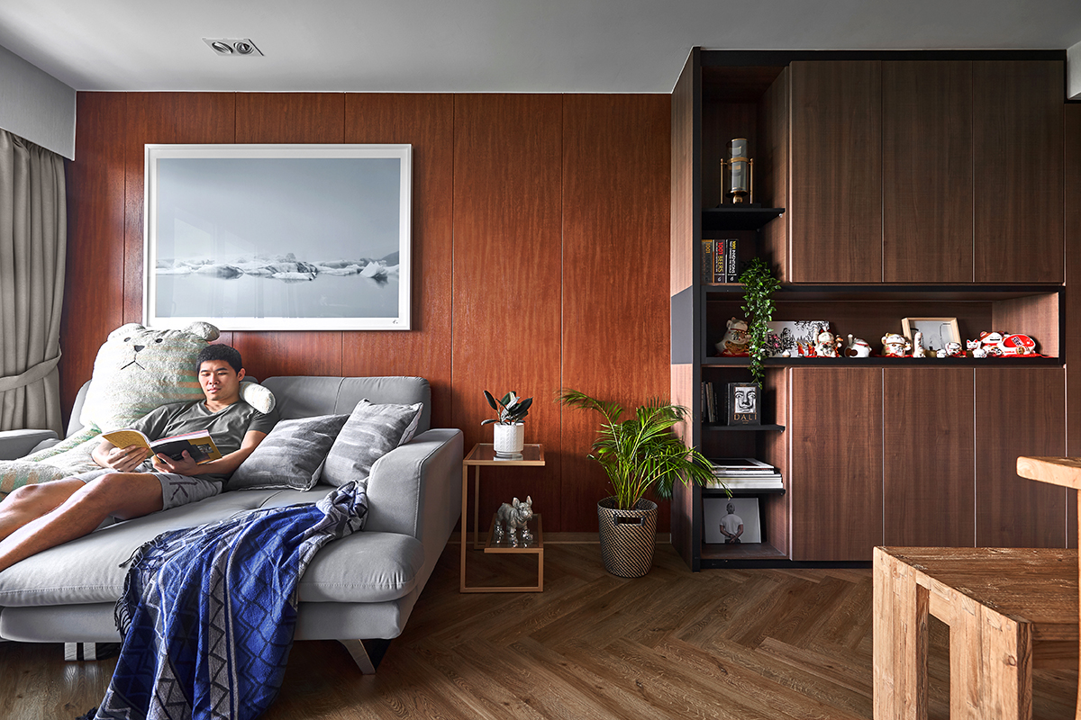 squarerooms ideasxchange red industrial rustic living room shelves sofa man