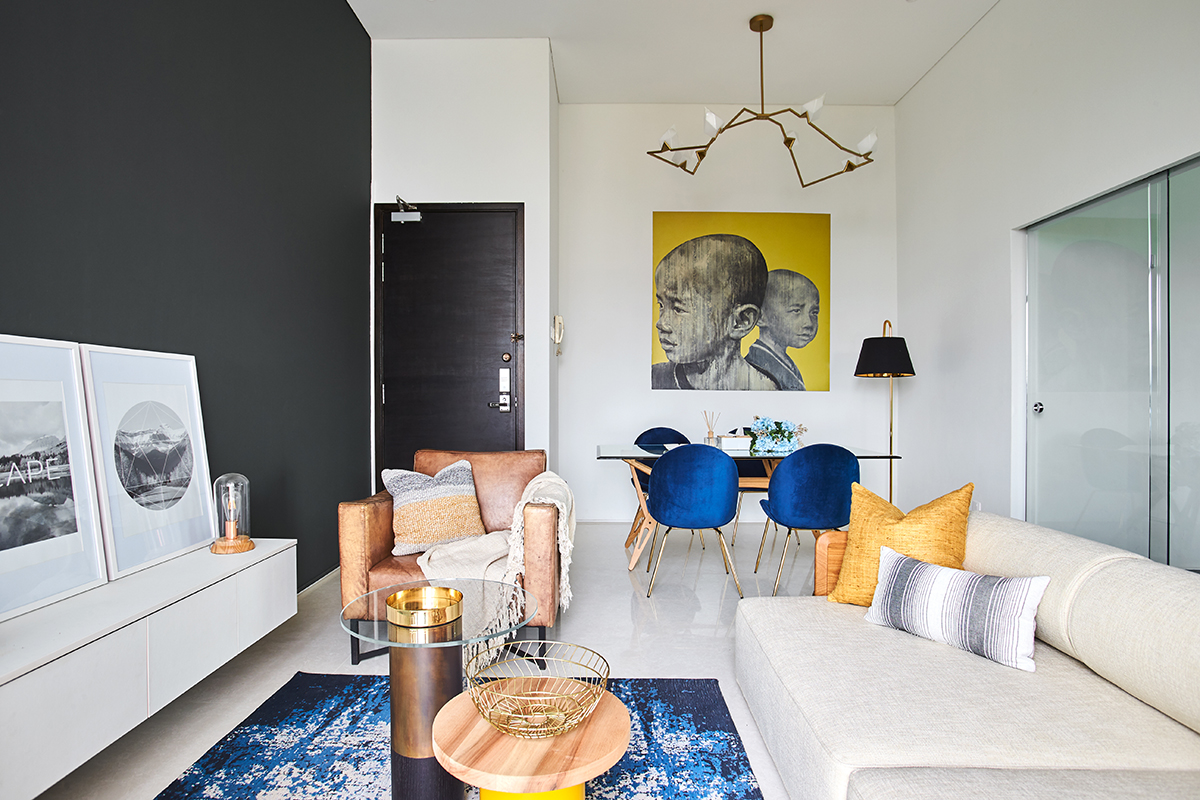 squarerooms bowerman interior planner home renovation design bold eclectic colourful penthouse apartment singapore flat living room bright rug couch blue orange bronze warm dining room