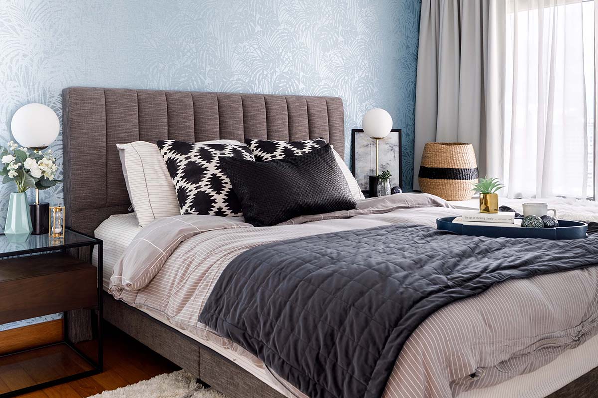 squarerooms home philosophy renovation 30K budget cost condo blue wallpaper wall bedroom bed