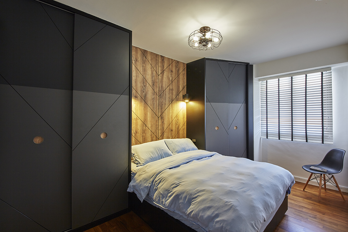 squarerooms ju design studio home renovation 4 room hdb flat industrial cosy dark wood punggol bedroom