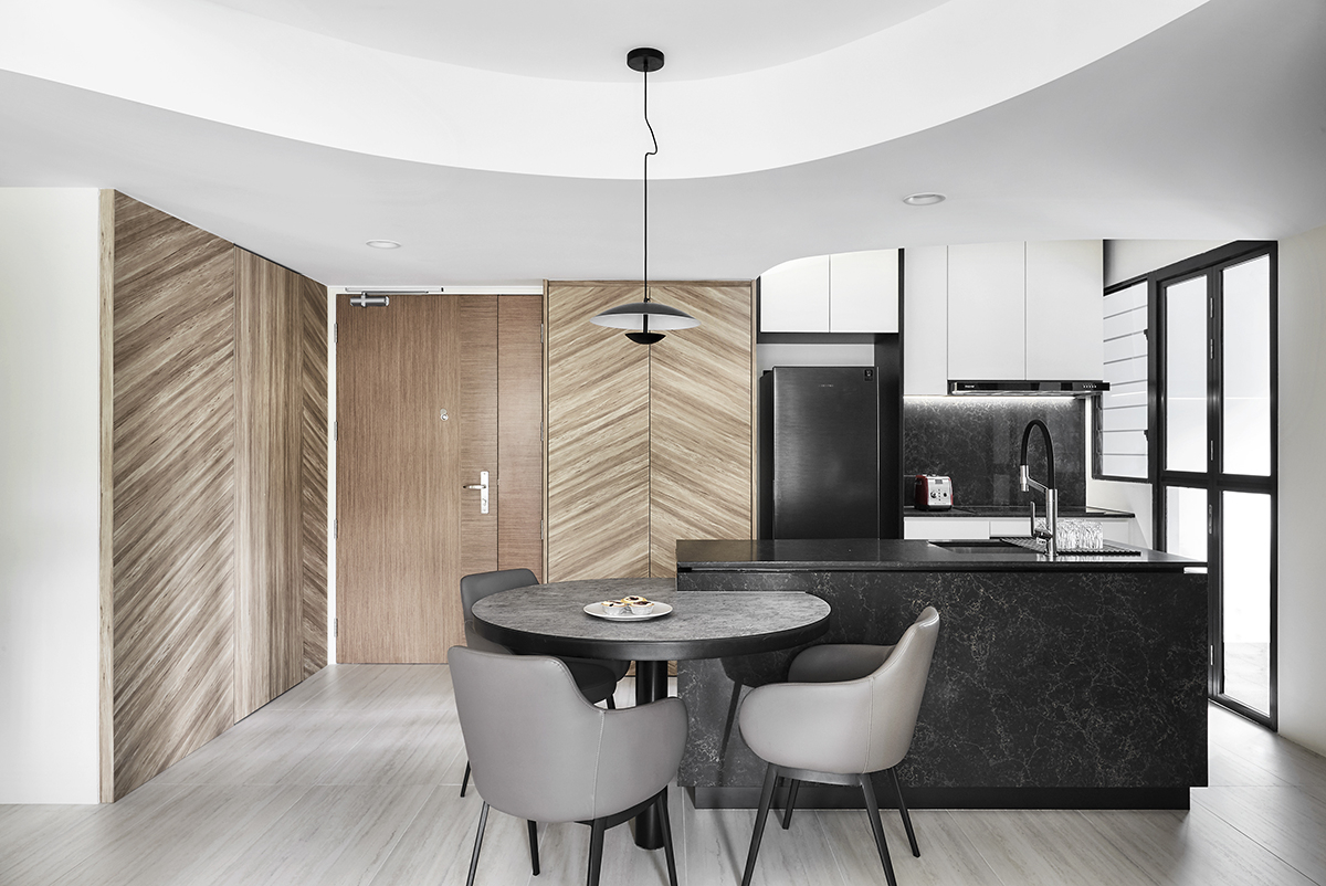 squarerooms notion of w home renovation hdb bto flat minimalist luxury monochromatic black and white wood kitchen dining island lamp