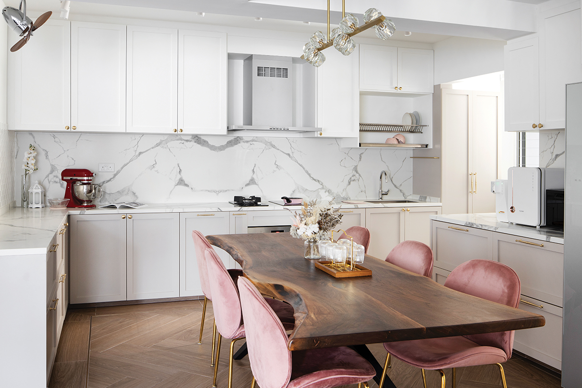 squarerooms fifth avenue interior design home makeover renovation contemporary pink and white cute soothing relaxing feminine parisian paris inspired 5 room hdb flat dining room kitchen open space concept chairs luxury luxurious luxe elegant marble backsplash wood live edge slab