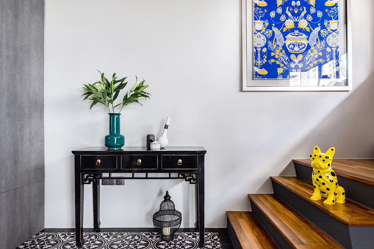 squarerooms maximalism maximalist home design look inspo inspiration interior ideas style decor distinctidentity staircase wooden blue yellow pattern artwork sculpture black side table tiles