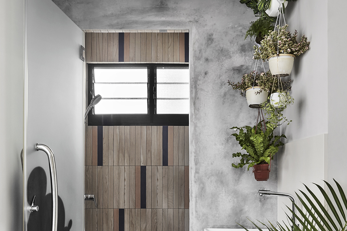 squarerooms Notion of W minimalist modern grey bathroom wood tiles mickey mouse home plants air hanging
