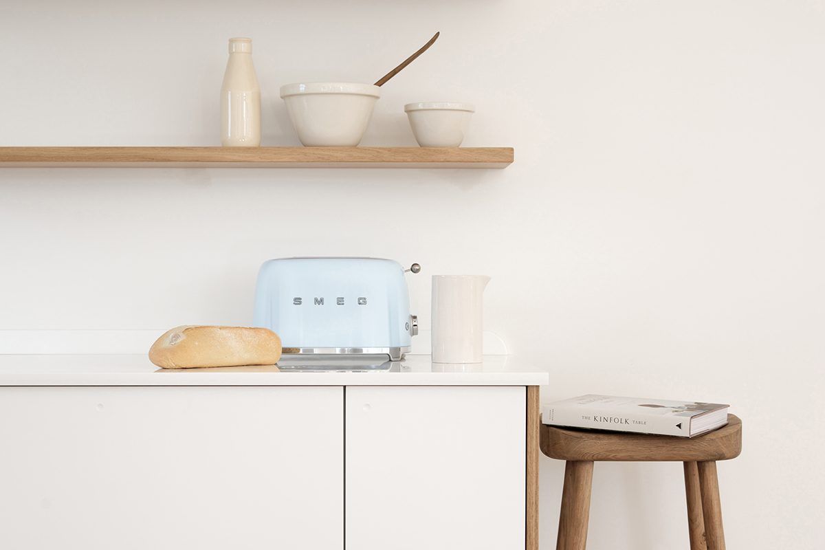 squarerooms smeg toaster kitchen appliances small pastel baby blue white cabinets cream wood shelves scandi cosy minimalist