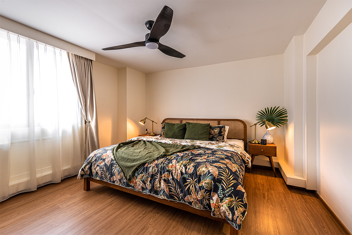 squarerooms swiss interior home renovation 4A 4 room hdb resale flat eclectic style design look makeover cosy bedroom bedding sheets tropical botanical leaves wood floors