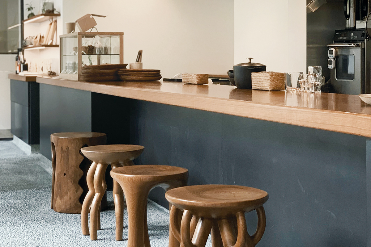 squarerooms Edvinas Bruzas Unsplash kitchen island bar counter black wood modern stools