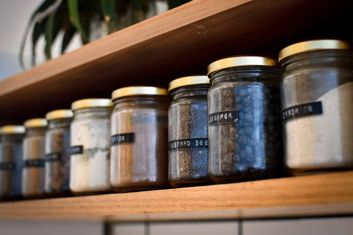 squarerooms heather mckean unsplash pantry kitchen food storage jars labels