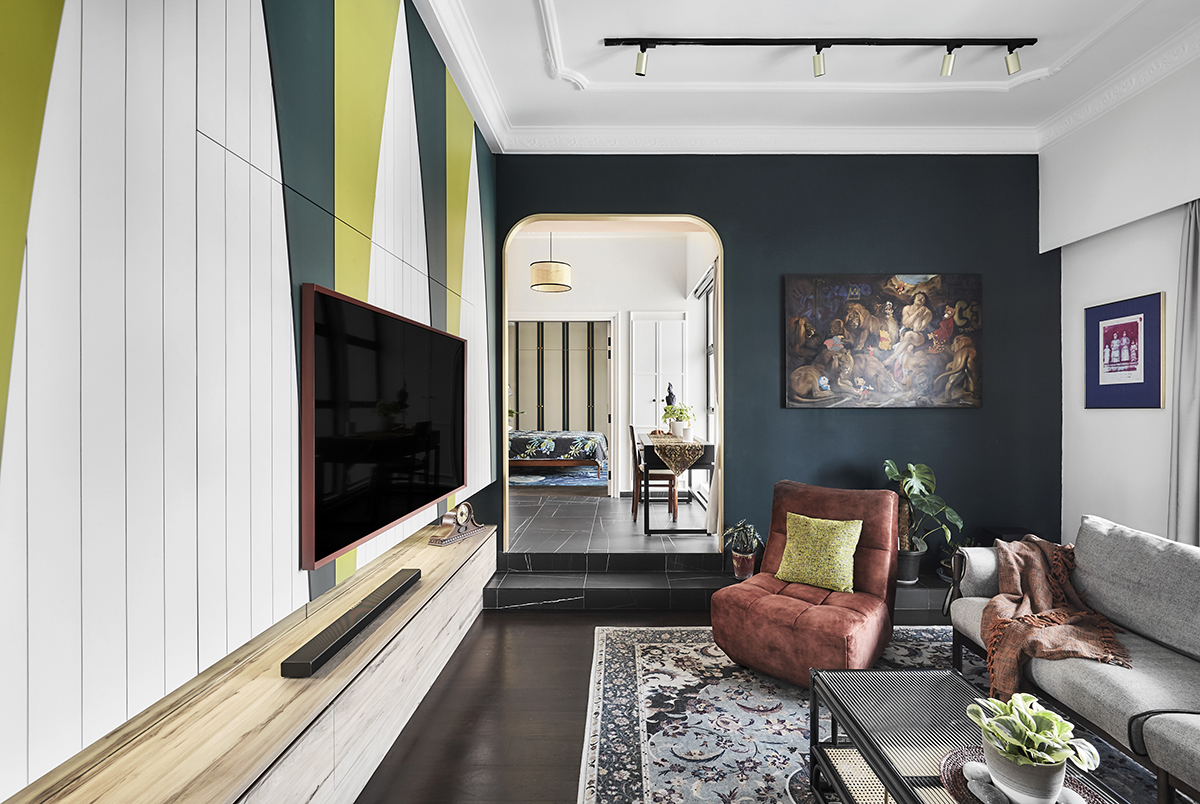 squarerooms linear space concepts eclectic colourful home interior design singapore east coast walk up apartment style maximalist bold vintage look living room blue wall archway curves