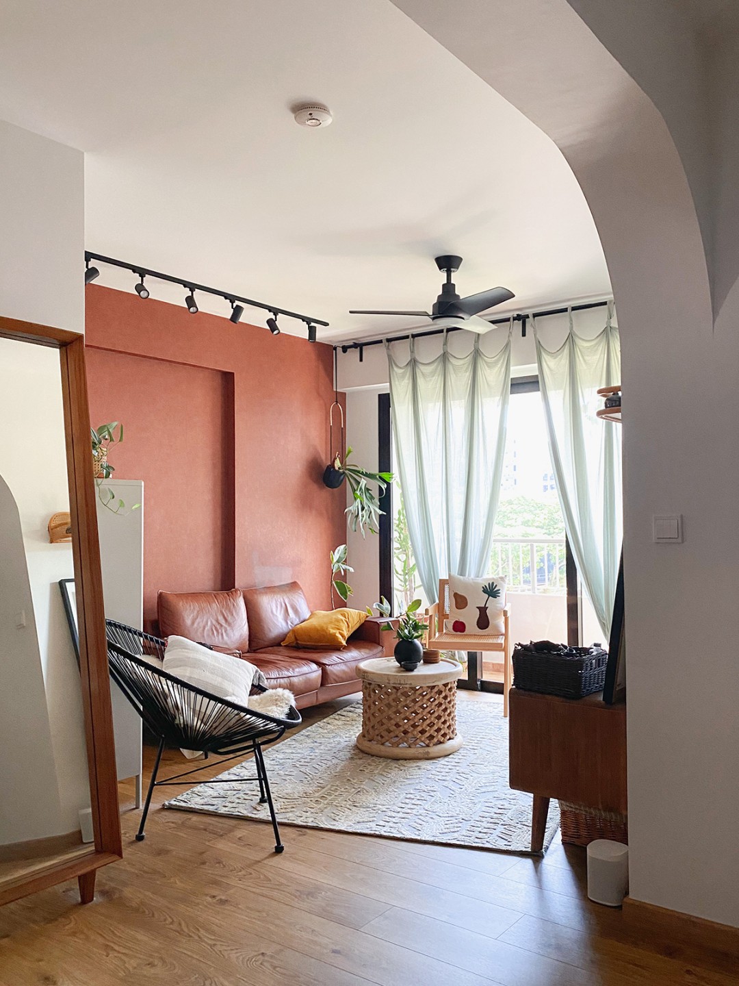 squarerooms cnbrr home fazlie corinne instagram bto flat account hdb homeowners interview singapore canberra mediterranean inspired design apartment style living room terracotta red wall