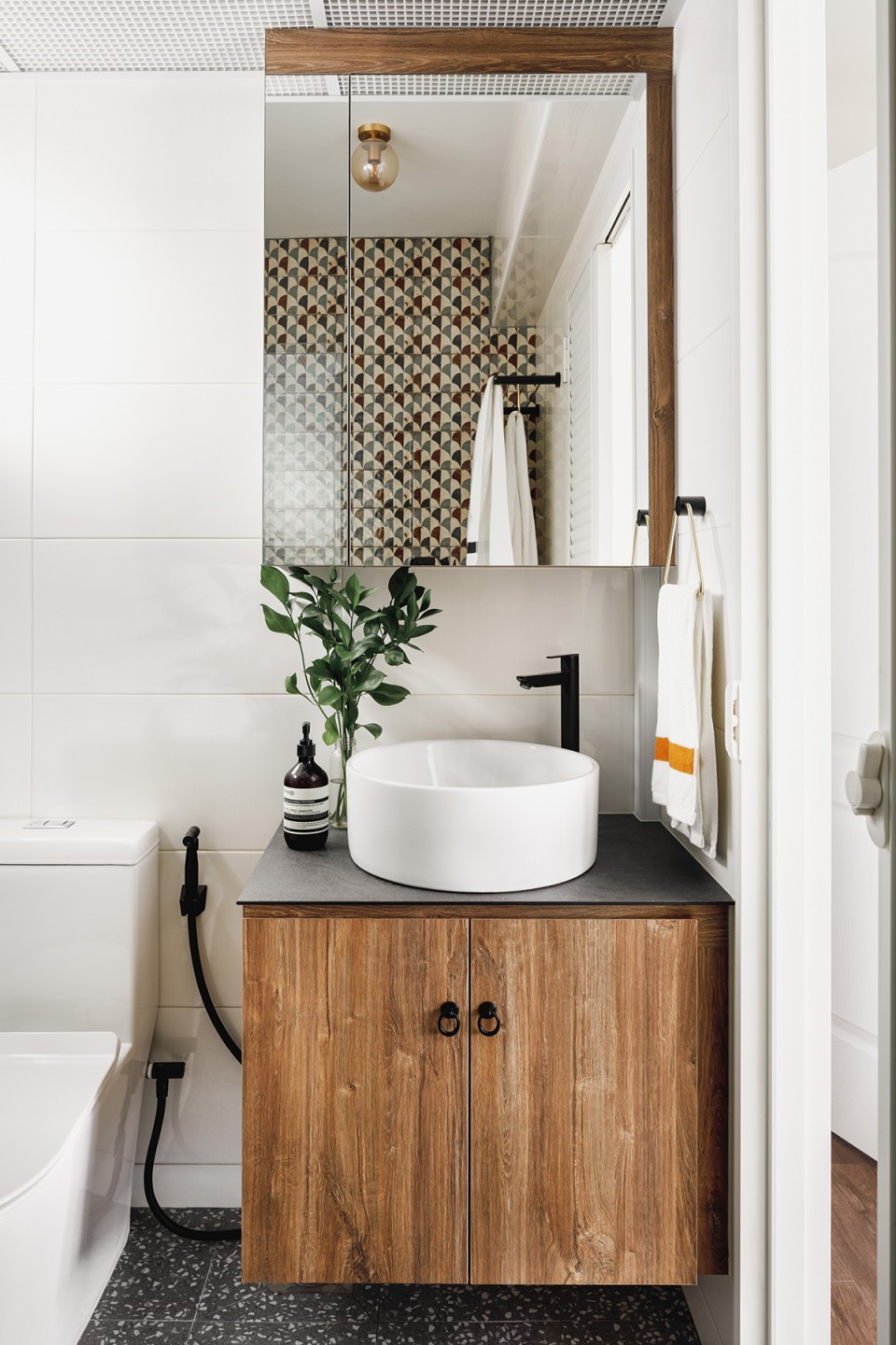 squarerooms cnbrr home fazlie corinne instagram bto flat account hdb homeowners interview singapore canberra mediterranean inspired design apartment style bathroom wood vamity patterned shower tiles countertop sink
