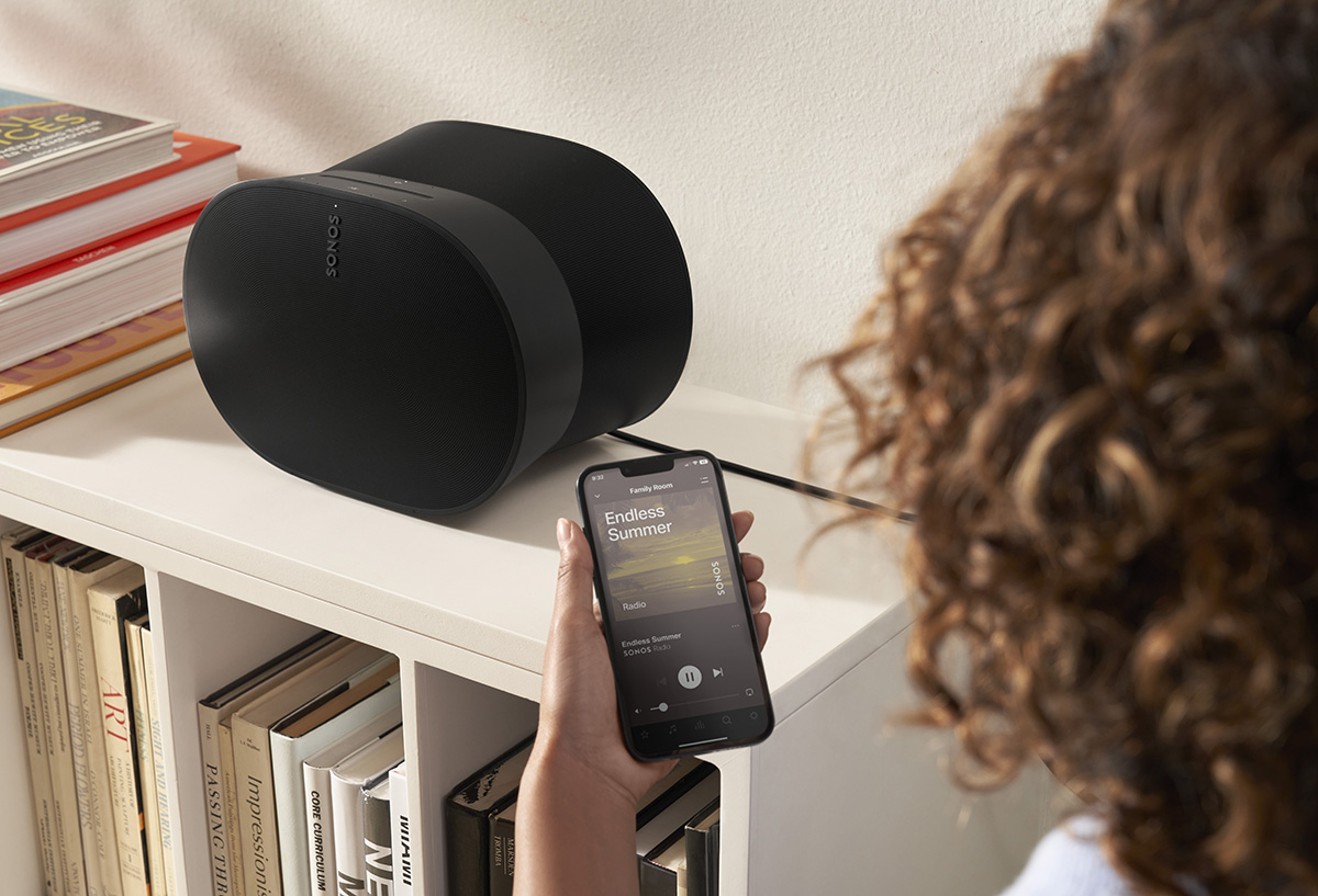 squarerooms sonos era 300 black speaker woman with phone in hand connecting bluetooth