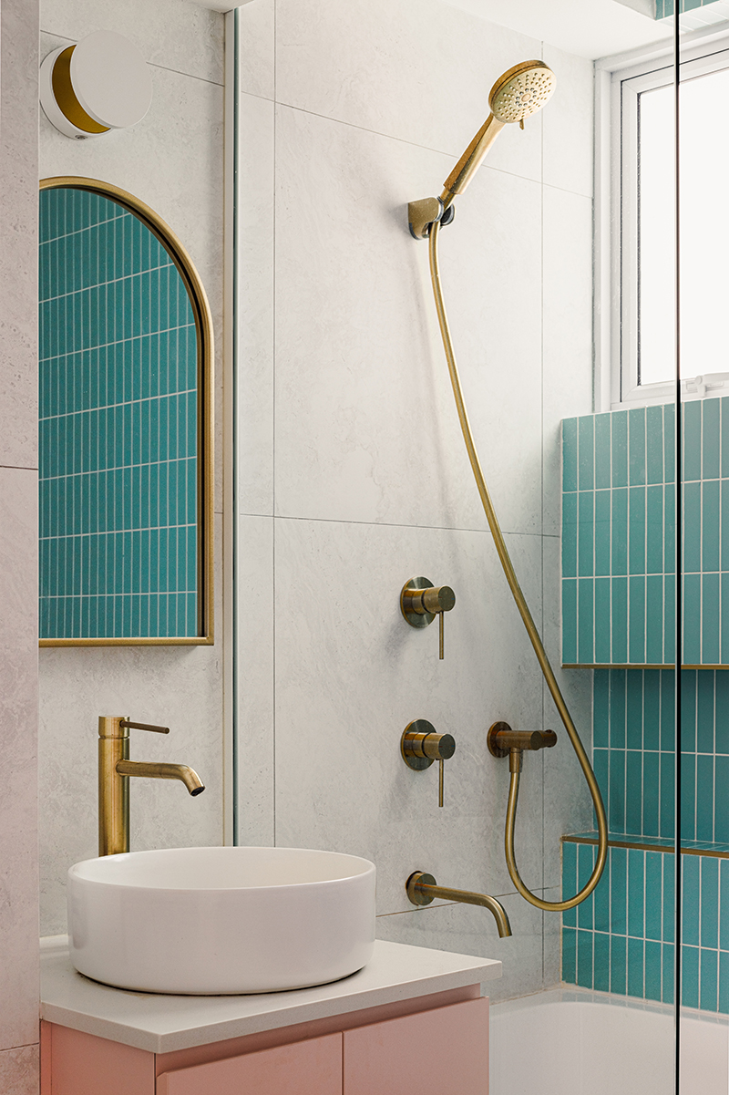 squarerooms the local inn.terior design home renovation eclectic contemporary style makeover bathroom blue tiles gold fittings shower