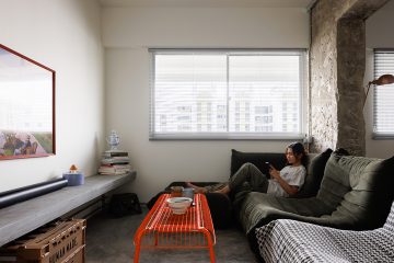 squarerooms knock knock studio interior design home renovation industrial eclctic style 4 room resale hdb flat makeover look living room area black grey red coffee table