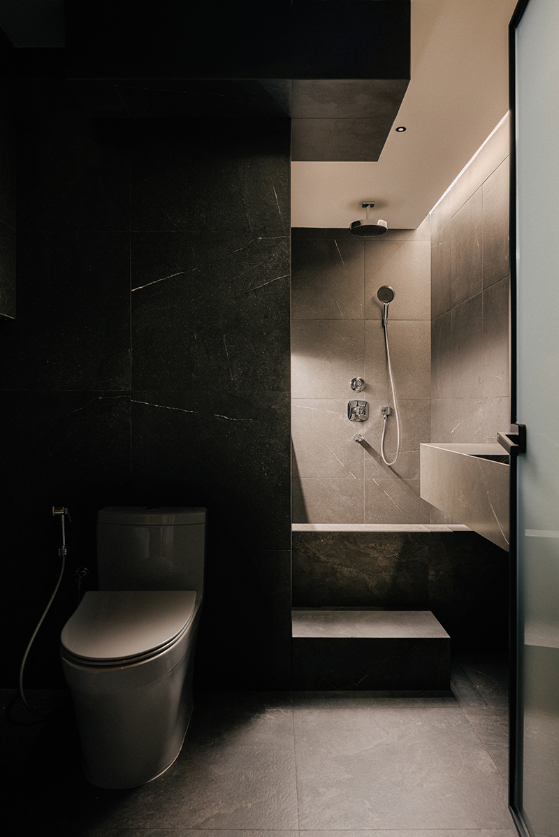 squarerooms oblivion lab executive hdb flat tampines contemporary style minimalist warm colour palette toilet bathroom dark grey black